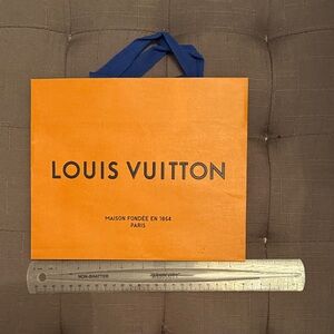 Louis Vuitton Men's Bag in Bold Orange with Blue Handles